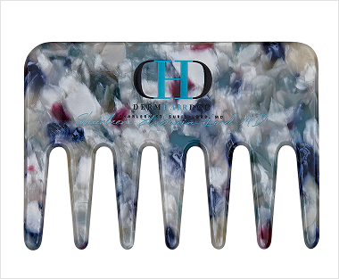 A comb with a blue, white and red design.