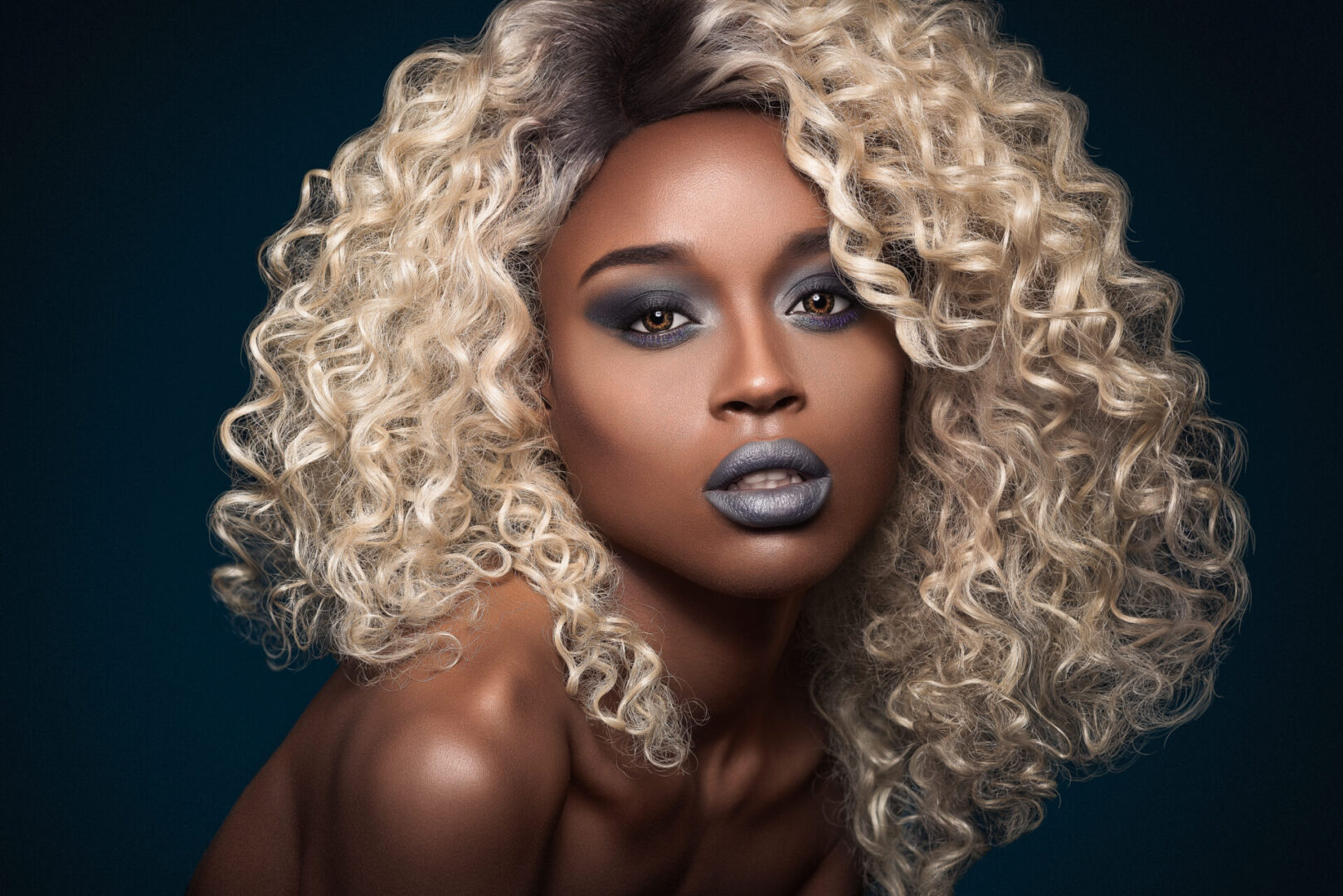 d8839306-9cbb-49cb-8591-8e7484f7c62e A woman with blonde hair and blue eyes.