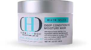 Hair mask container on black background.