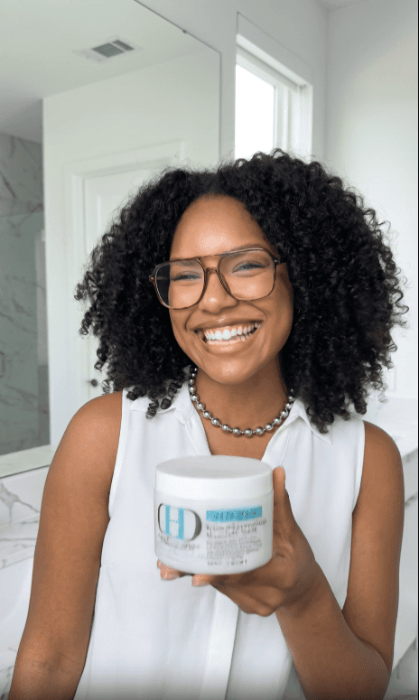 Female dermatologist developing science-backed hair care products